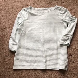 Teal and white 3/4 sleeve top.